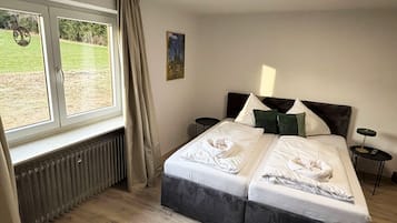 Deluxe Apartment, Resort View | In-room safe, blackout curtains, iron/ironing board, free WiFi