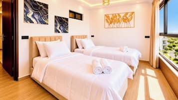 2 habitaciones, tabla de planchar con plancha, wifi y ropa de cama