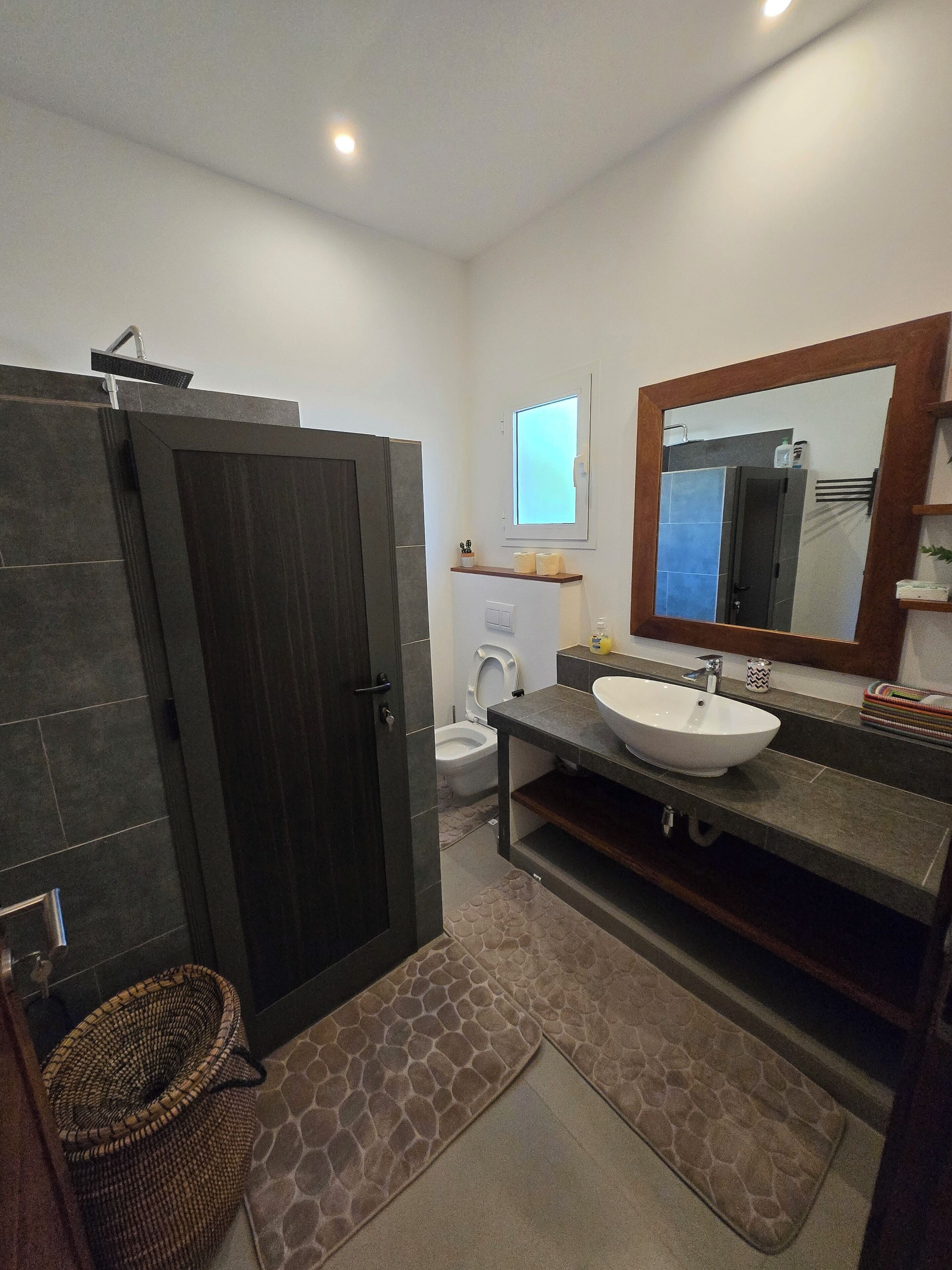 Shower, hair dryer, towels, toilet paper