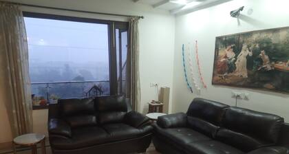 Breathe Fresh Air, Bask in roof top Sun next to Aravali hills