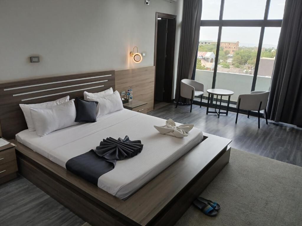 Suite, Balcony, City View | Desk, laptop workspace, free WiFi