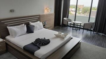 Suite, Balcony, City View | Desk, laptop workspace, free WiFi