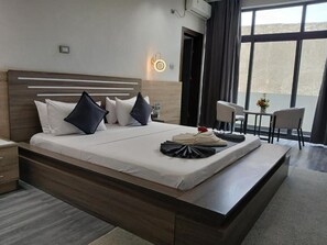 Suite, Balcony, City View | Desk, laptop workspace, free WiFi