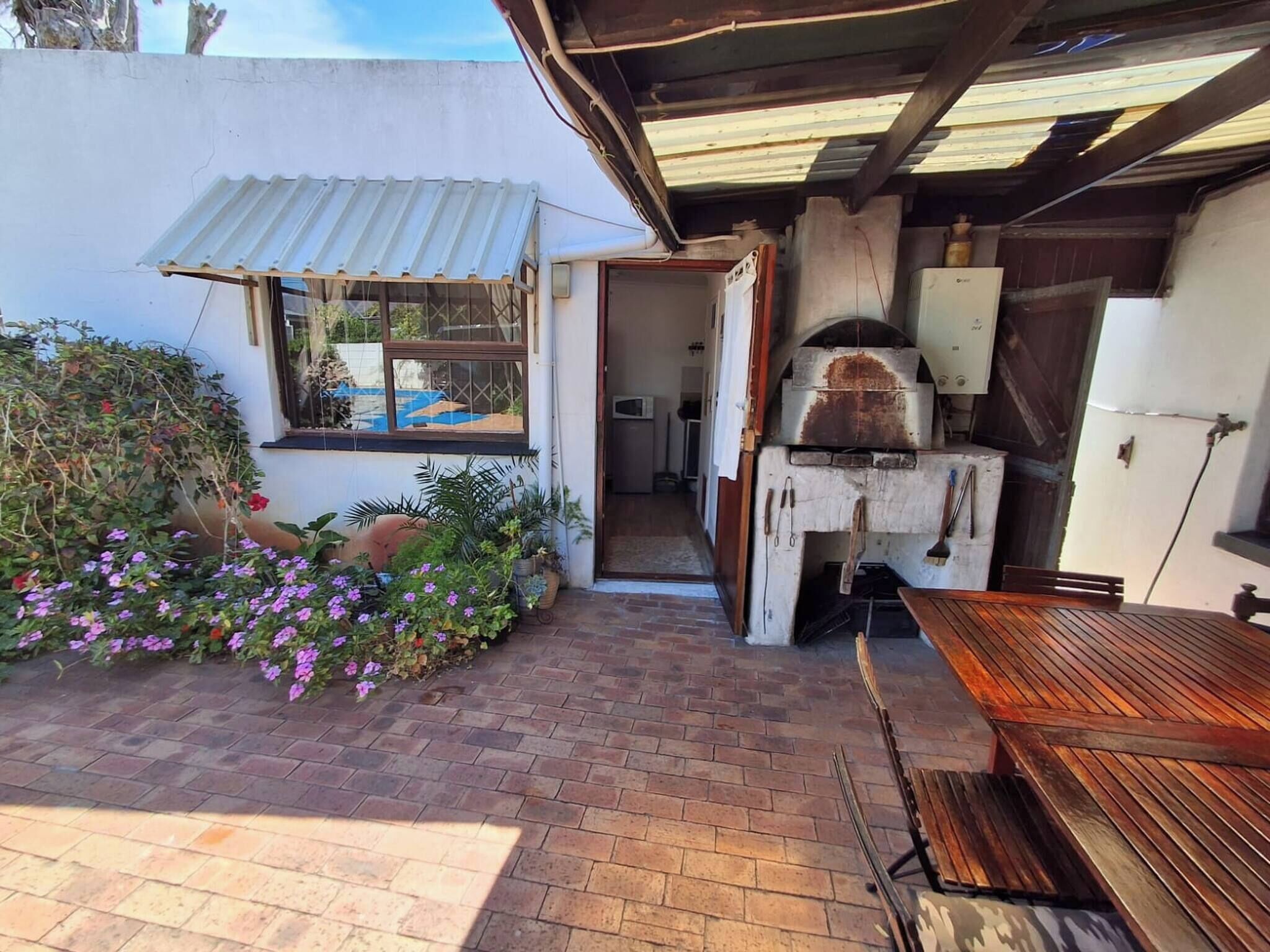 Apartamento, 1 quarto, para fumantes, vista para o jardim | Opções para refeição ao ar livre