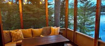 New - Cozy lakefront cabin on private wooded peninsula with bunkhouse and sauna