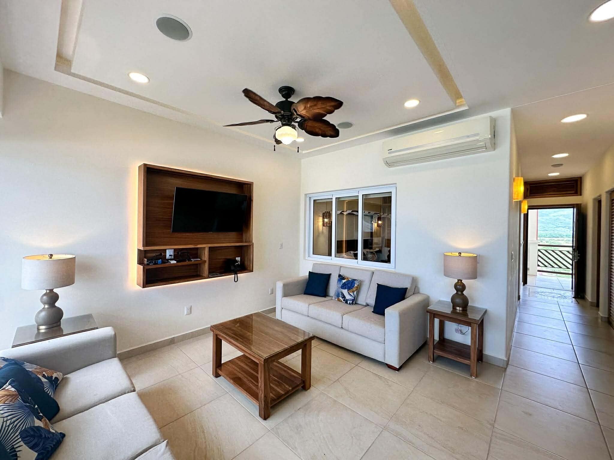 디럭스 아파트, 바다 전망 | 거실 공간