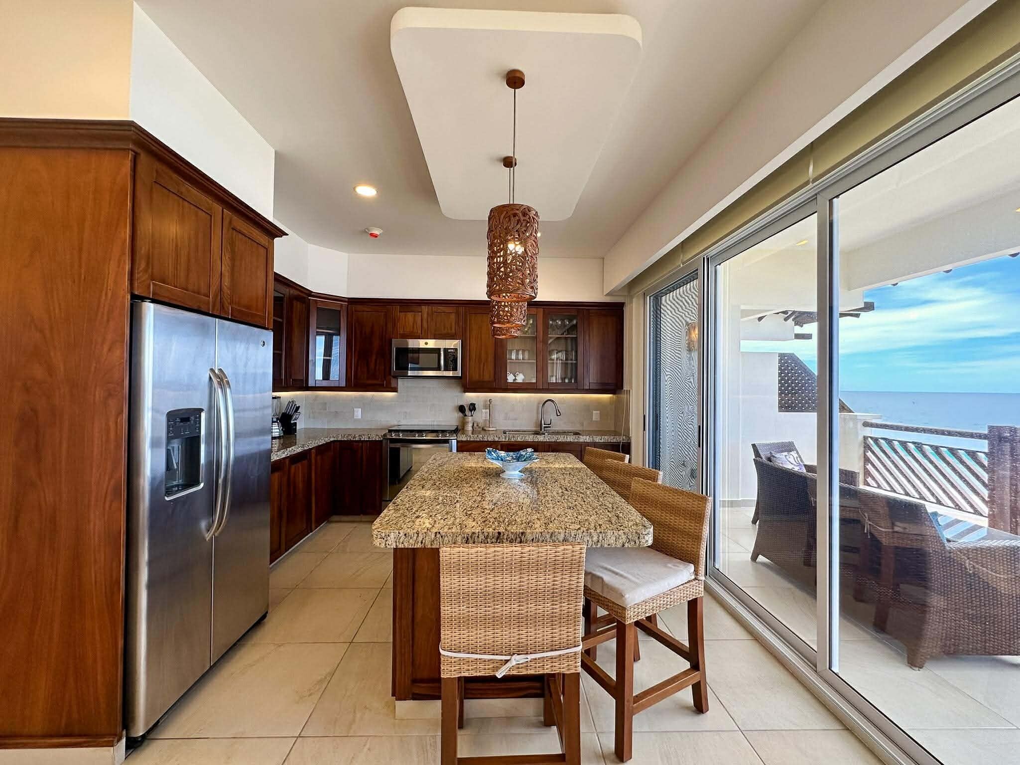 Departamento Deluxe, vista al océano | Cocina privada