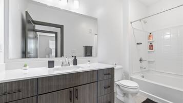 Hair dryer, towels, soap, toilet paper