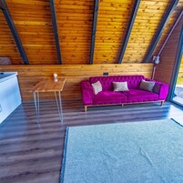 Bungalow Deluxe, vistas a la piscina | Zona de estar