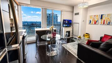 Comfort Condo, 1 Queen Bed with Sofa bed, Kitchen, City View | Living area | 42-inch LED TV with digital channels, fireplace, streaming services
