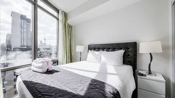 Condo Confort, vista a la ciudad | Cortinas blackout, tabla de planchar con plancha y wifi gratis