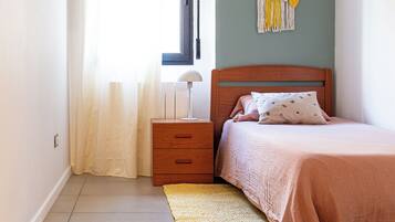 2 dormitorios, cuna de viaje, wifi gratis y ropa de cama