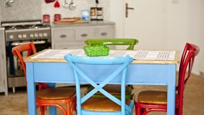 A dining table with chairs, a basket, and papers on the table. - Relais of Hearts with terrace (Matino)