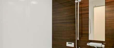 Separate tub and shower, free toiletries, hair dryer, slippers