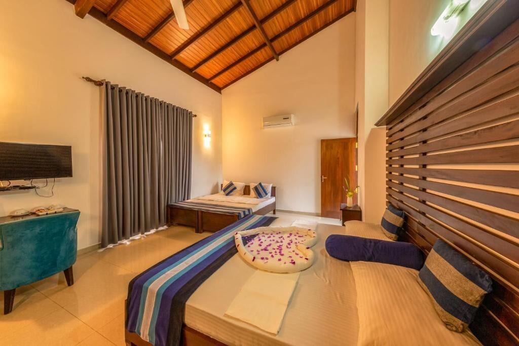 Habitación cuádruple Deluxe | Escritorio y wifi gratis