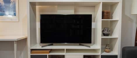 Smart TV, books, music library, stereo