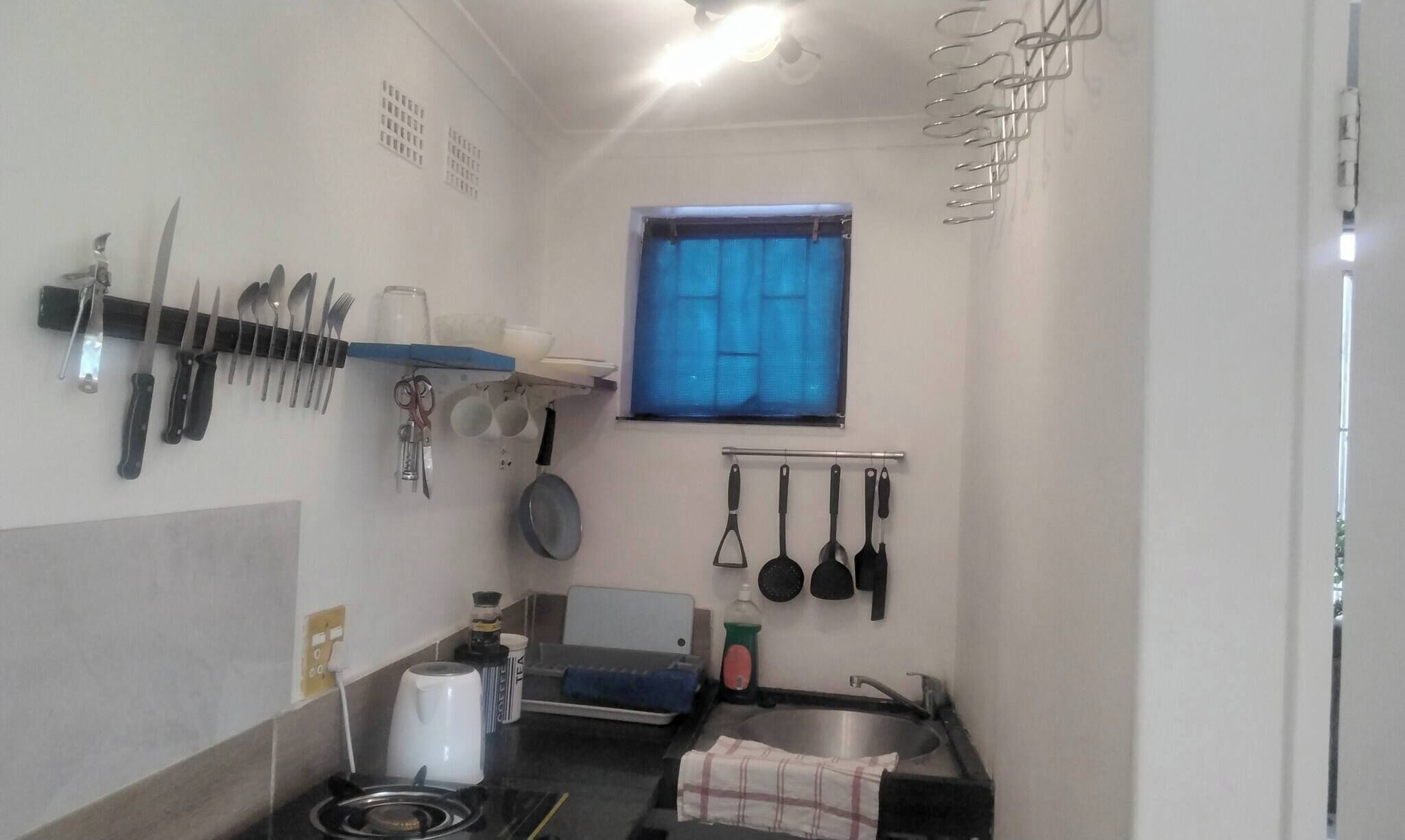 Fridge, microwave, stovetop, cookware/dishes/utensils
