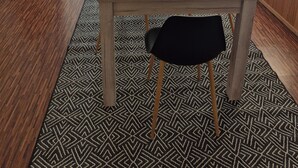 Zona pranzo con tavolo in legno, sedie nere, tappeti decorati e un'ampia finestra con tende.