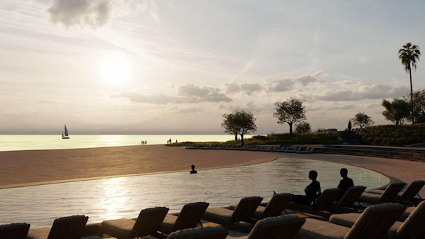 A poolside area with lounge chairs, a person swimming, and a sailboat on the water.