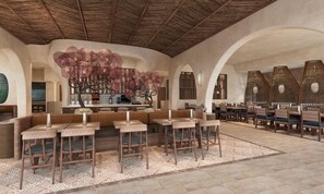 A spacious dining area with high ceilings and a central decorative tree. Tables and chairs are arranged for dining. - Grand Hyatt Los Cabos Resort, Golf & Spa, All-Inclusive (Cabo San Lucas)