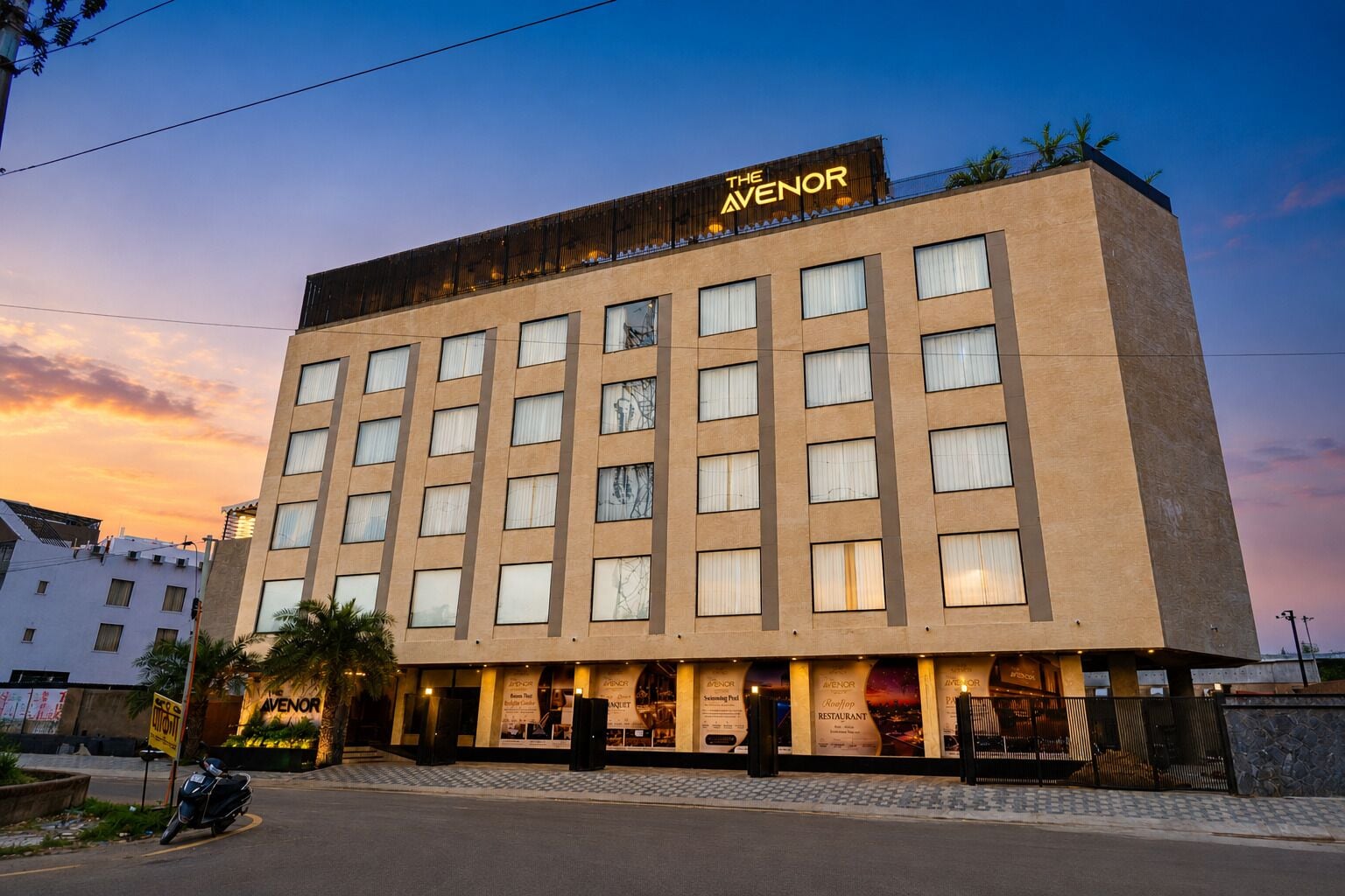 A multi-story hotel with a prominent sign reading 'The Avenor.'