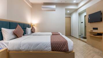 Desk, laptop workspace, free WiFi, bed sheets