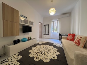 Apartamento Deluxe, vistas al patio | Zona de estar