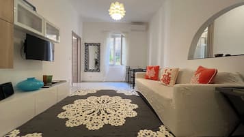 Appartamento Deluxe, vista cortile | Area soggiorno