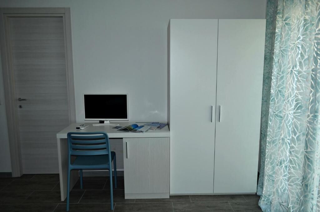 Quarto triplo família, vista para o pátio | Parte interna