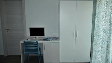 Quarto triplo família, vista para o pátio | Parte interna