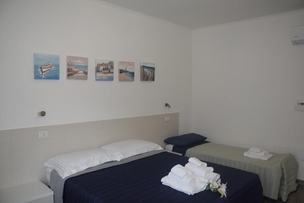 Quarto triplo conforto, vista para o jardim