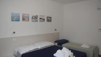 Quarto triplo conforto, vista para o jardim