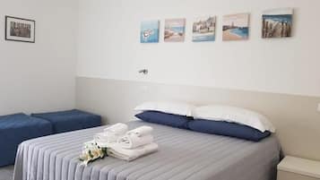 Habitación triple familiar, vista al patio