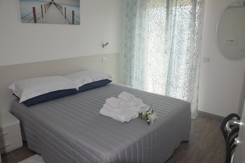 Quarto casal luxo, sacada, vista para a cidade