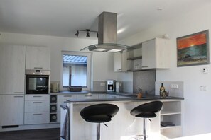 Private kitchen - Vacation home Harmonia, experience nature on the Bodden and Baltic Sea (Saal)