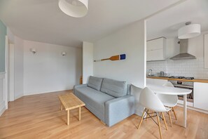 Apartamento família |  Área de estar