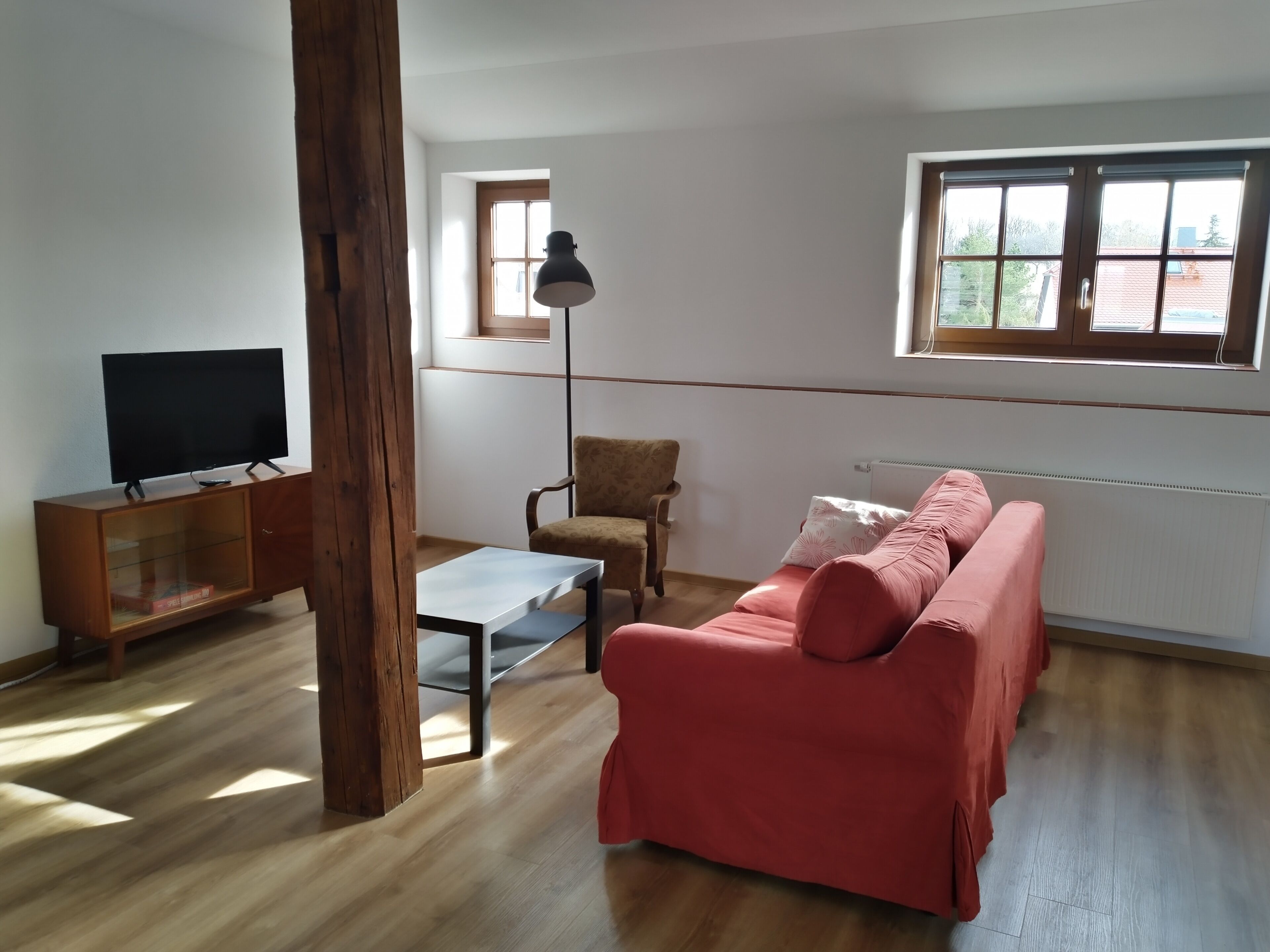 Classic-Apartment, 1 Schlafzimmer, Haustiere gestattet, Gartenblick | Wohnbereich