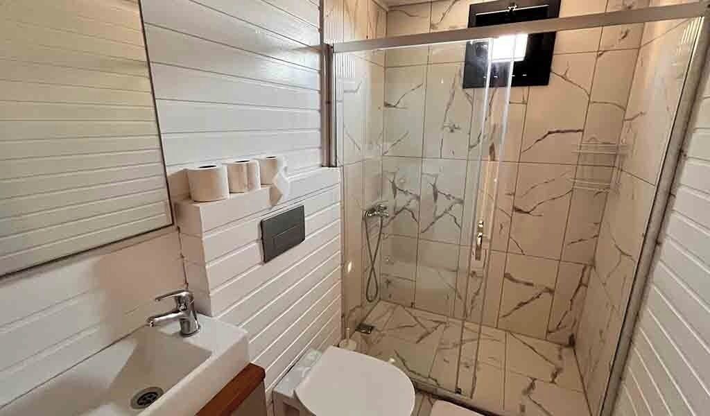 Shower, hair dryer, bathrobes, towels