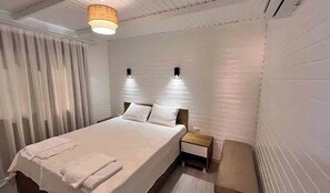 Roba de llit d'alta qualitat, minibar i decoració individual 