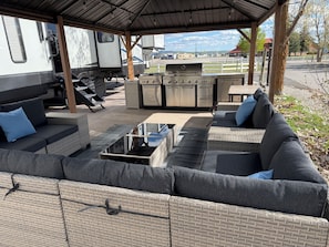 Terrace/patio - Beautiful Star Valley RV campground 5th wheel with pool, golf, & private gazebo (Thayne)