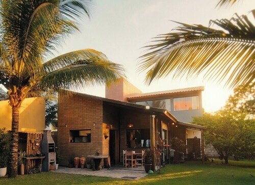 Beach house: "feet in the sand" 1 minute from the freshwater pipes on the beachfront.