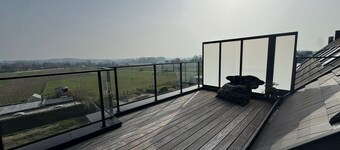 Newly built apartment with beautiful spacious sun terrace - view of Pajottenland