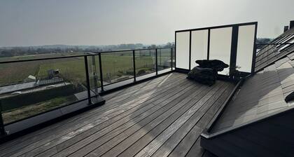 Newly built apartment with beautiful spacious sun terrace - view of Pajottenland