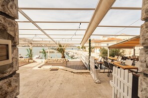 Outdoor dining - NEW-first-row-direct sea view-all-in equipment-2 SZ-1 Bathroom-kitchen (Pag)