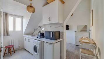 Apartment | Private kitchen | Coffee/tea maker, fridge, microwave, stovetop