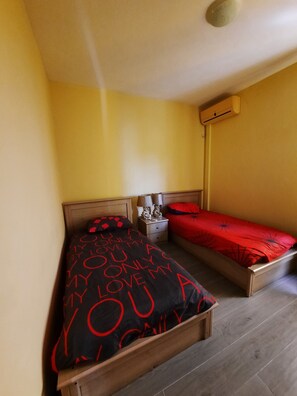 2 habitaciones, tabla de planchar con plancha, internet y ropa de cama 