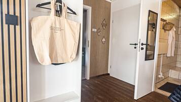 Shower, hair dryer, towels, toilet paper