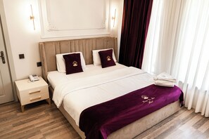 Deluxe Double Room, Balcony, Courtyard View | In-room safe, blackout curtains, soundproofing, iron/ironing board - Cardinal Boutique Hotel (Baku)