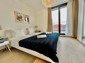 Apartament | 1 dormitori i espai de treball apte per a portàtils 