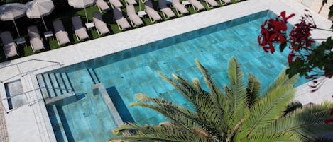 Seasonal outdoor pool, pool umbrellas, sun loungers